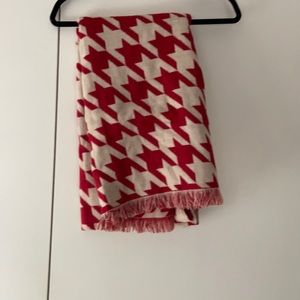 red and white patterned blanket scarf